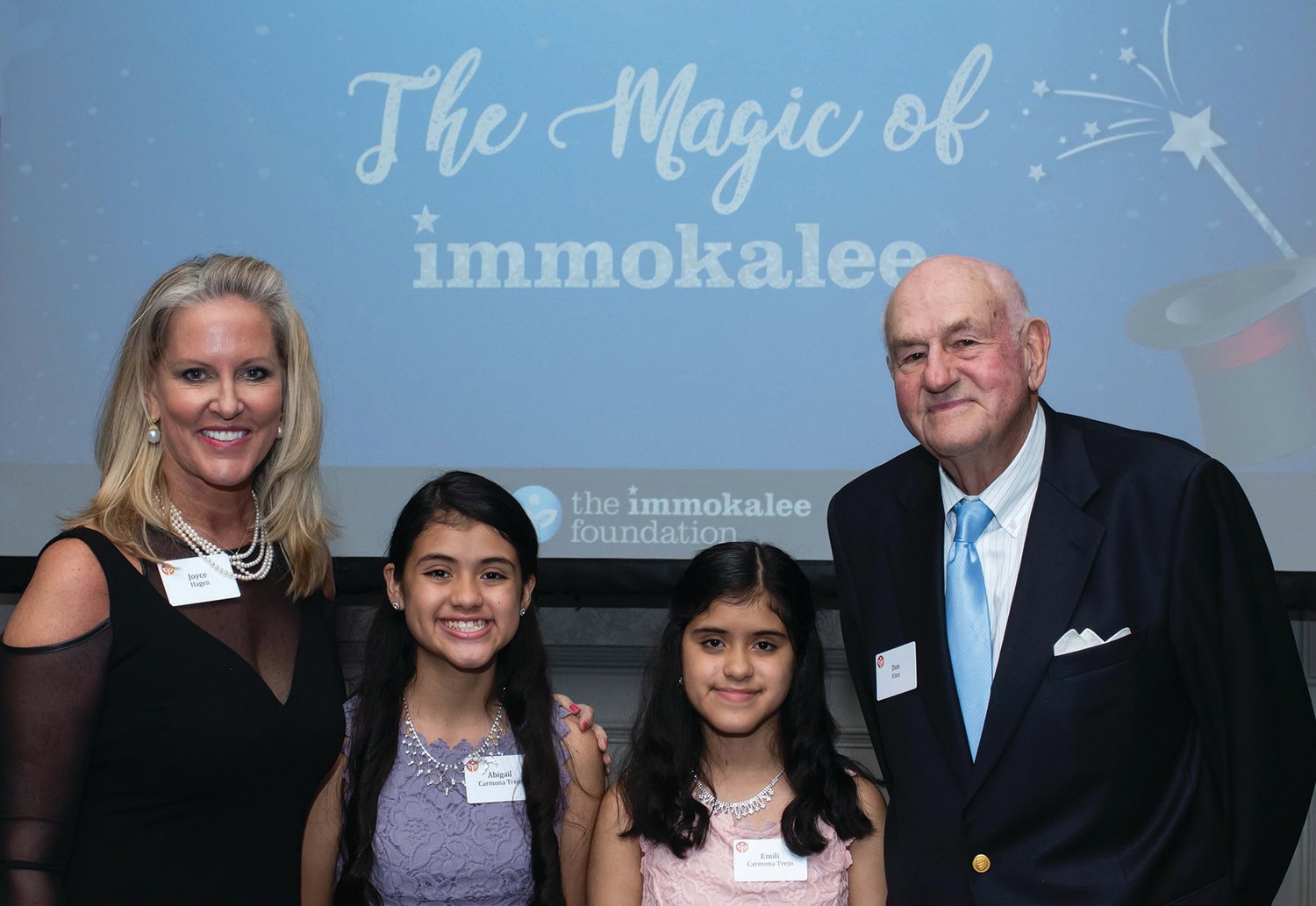 Joyce Hagen and Don Fites join The Immokalee Foundation students Abigail and Emili at the 2019 Charity Classic Celebration.